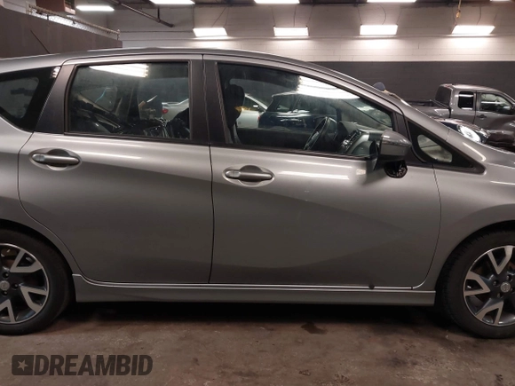 2015 Nissan Note SV with VIN 3N1CE2CP0FL400447, listed as a IAAI auction lot 41669498 with 96,699 mi miles and . Bid and sale history available at DreamBid. Image 14.