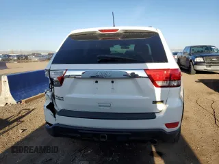 2011 Jeep Grand Cherokee Laredo with VIN 1J4RR4GG4BC640277, listed as a Copart auction lot 52166205 with 195,877 mi miles and Salvage Title. Bid and sale history available at DreamBid. Image 6.