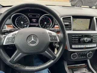 2014 Mercedes-Benz M 550 with VIN 4JGDA7DB5EA423124, listed as a Copart auction lot 53713385 with 215,650 mi miles and Clean Title. Bid and sale history available at carsss.com. Image 7.