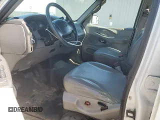 1997 Ford Expedition XLT with VIN 1FMEU17L2VLB74797, listed as a Copart auction lot 61377745 with 236,140 mi miles and Salvage title. Bid and sale history available at DreamBid. Image 7.