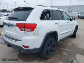 2013 Jeep Grand Cherokee Limited with VIN 1C4RJFBT3DC545662, listed as a IAAI auction lot 41576431 with 153,142 mi miles. Bid and sale history available at carsss.com. Image 4.