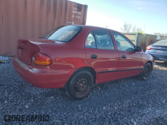 1997 Hyundai Accent с VIN KMHVF24N5VU369924, выставлен на аукционе Copart как лот 85036114 с пробегом 168 797 миль миль и Списание • Salvage title. История ставок и продаж доступна на DreamBid. Изображение 3.