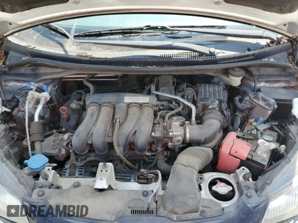 2015 Honda Fit EX-L with VIN 3HGGK5H84FM708209, listed as a Copart auction lot 59337085 with 130,355 mi miles and Salvage title. Bid and sale history available at DreamBid. Image 12.