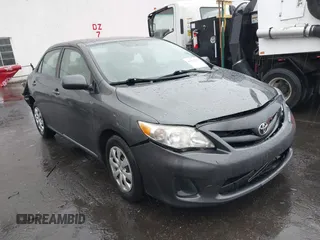 2011 Toyota Corolla L with VIN 2T1BU4EE4BC643260, listed as a IAAI auction lot 41833210 with 218,062 mi miles. Bid and sale history available at carsss.com. Image 1.