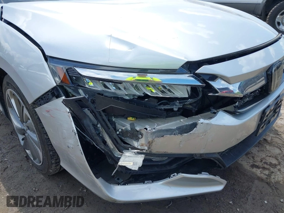 2018 Honda Clarity z VIN JHMZC5F14JC007026, wystawiony jako IAAI lot #42361556 z przebiegiem 74 132 mil mil oraz . Historia ofert i sprzedaży dostępna na DreamBid. Obrazek 6.