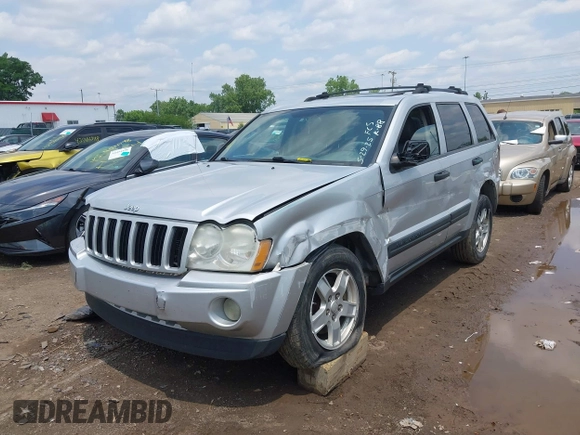 2005 Jeep Grand Cherokee Laredo z VIN 1J4GR48K35C515589, wystawiony jako IAAI lot #42452874 z przebiegiem 253 743 mil mil oraz . Historia ofert i sprzedaży dostępna na DreamBid. Obrazek 12.