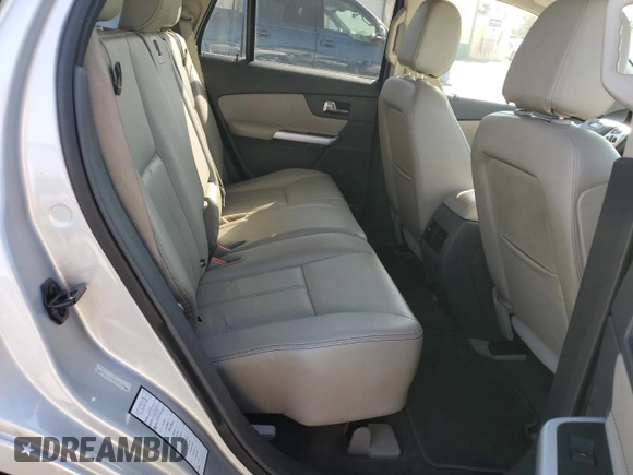 2013 Ford Edge Limited z VIN 2FMDK4KC7DBC22898, wystawiony jako Copart lot #75003474 z przebiegiem 145 159 mil mil oraz Szkoda całkowita • Salvage title. Historia ofert i sprzedaży dostępna na DreamBid. Obrazek 10.