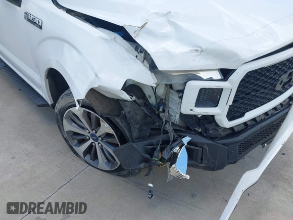 2019 Ford F-150 XL with VIN 1FTEW1CP5KKE62001, listed as a IAAI auction lot 42611277 with 207,262 mi miles and . Bid and sale history available at DreamBid. Image 6.