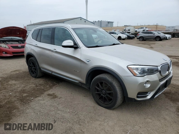 2015 BMW X3 xDrive28i with VIN 5UXWX9C5XF0D47847, listed as a Copart auction lot 52803715 with 128,814 mi miles and Clean Title. Bid and sale history available at DreamBid. Image 4.