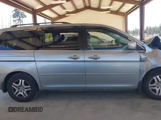 2007 Honda Odyssey EX-L with VIN 5FNRL38657B035542, listed as a IAAI auction lot 42185191 with Not Provided miles and . Bid and sale history available at DreamBid. Image 14.
