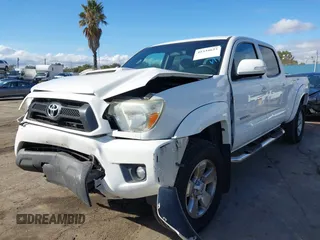 2015 Toyota Tacoma PreRunner with VIN 3TMKU4HN6FM044238, listed as a IAAI auction lot 41534623 with 196,490 mi miles and . Bid and sale history available at DreamBid. Image 19.