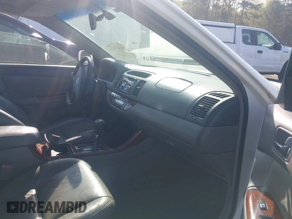 2003 Toyota Camry LE with VIN 4T1BE32K33U249945, listed as a IAAI auction lot 41907000 with 279,723 mi miles and . Bid and sale history available at DreamBid. Image 5.