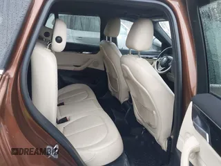 2016 BMW X1 xDrive28i with VIN WBXHT3C31GP881488, listed as a IAAI auction lot 41693116 with 120,922 mi miles. Bid and sale history available at carsss.com. Image 8.