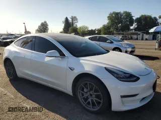 2020 Tesla Model 3 Standard Range Plus z VIN 5YJ3E1EAXLF644911, wystawiony jako Copart lot #52390785 z przebiegiem 138 783 mil mil oraz Szkoda całkowita • Salvage title. Historia ofert i sprzedaży dostępna na DreamBid. Obrazek 4.