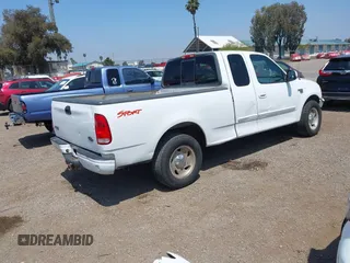 2000 Ford F-150 XL with VIN 1FTRX17L2YNA03263, listed as a IAAI auction lot 42326528 with Not provided miles and . Bid and sale history available at DreamBid. Image 4.
