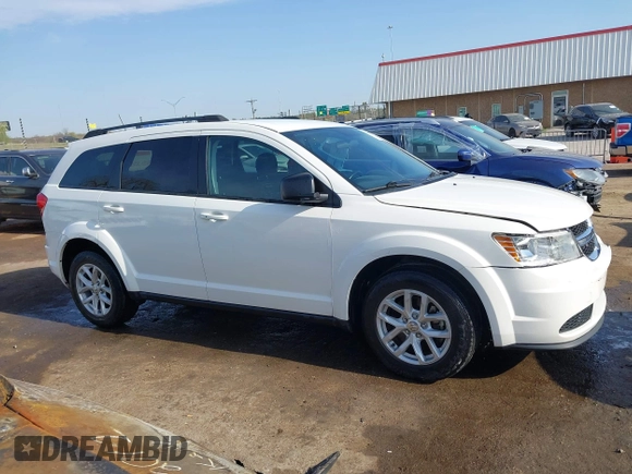 2014 Dodge Journey SE with VIN 3C4PDCAB0ET293641, listed as a IAAI auction lot 42001844 with 138,740 mi miles. Bid and sale history available at carsss.com. Image 13.