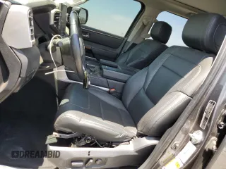 2022 Toyota Tundra Limited with VIN 5TFJA5DB8NX013040, listed as a Copart auction lot 56982095 with 42,015 mi miles and Salvage title. Bid and sale history available at DreamBid. Image 7.