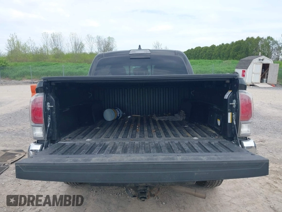 2023 Toyota Tacoma SR with VIN 3TMCZ5AN2PM598464, listed as a IAAI auction lot 42238032 with 35,597 mi miles and . Bid and sale history available at DreamBid. Image 16.