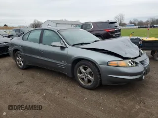 2004 Pontiac Bonneville SLE z VIN 1G2HY52K24U164098, wystawiony jako Copart lot #82283344 z przebiegiem 132 456 mil mil oraz Szkoda całkowita • Salvage title. Historia ofert i sprzedaży dostępna na DreamBid. Obrazek 4.