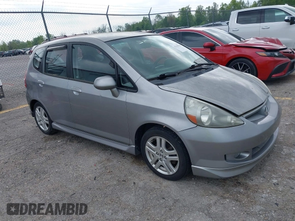 2007 Honda Fit Sport with VIN JHMGD37697S040265, listed as a IAAI auction lot 42130310 with 127,906 mi miles. Bid and sale history available at carsss.com. Image 1.