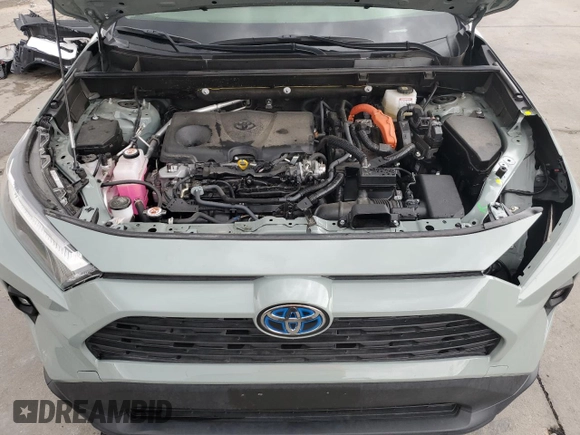 2023 Toyota RAV4 Hybrid XLE Premium with VIN JTMB6RFV7PD116071, listed as a Copart auction lot 51510795 with 16,399 mi miles and Salvage Title. Bid and sale history available at carsss.com. Image 12.