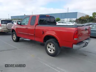 2002 Ford F-150 XL z VIN 1FTRX18W92KE21921, wystawiony jako IAAI lot #42488433 z przebiegiem 151 746 mil mil oraz . Historia ofert i sprzedaży dostępna na DreamBid. Obrazek 3.