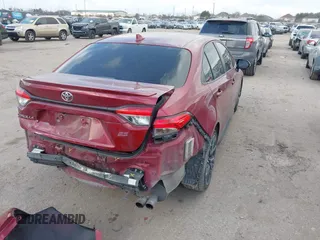 2022 Toyota Corolla SE with VIN JTDS4MCE2NJ098574, listed as a IAAI auction lot 41533041 with 130,379 mi miles and . Bid and sale history available at DreamBid. Image 4.