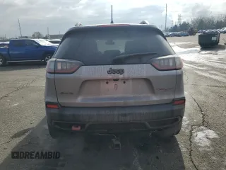 2019 Jeep Cherokee Trailhawk with VIN 1C4PJMBX8KD314746, listed as a Copart auction lot 51801135 with 124,281 mi miles and Salvage title. Bid and sale history available at DreamBid. Image 6.