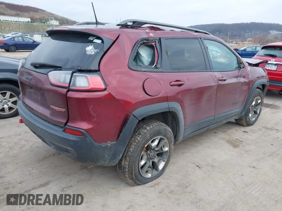 2019 Jeep Cherokee Trailhawk with VIN 1C4PJMBX1KD314149, listed as a IAAI auction lot 40929910 with 77,000 mi miles and . Bid and sale history available at DreamBid. Image 4.
