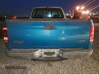 1997 Ford F-150 with VIN 1FTDX1729VND13052, listed as a Copart auction lot 83251714 with 134,450 mi miles and Salvage title. Bid and sale history available at DreamBid. Image 6.