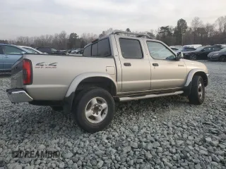 2000 Nissan Frontier XE with VIN 1N6ED27Y3YC366060, listed as a Copart auction lot 48955585 with 158,565 mi miles and Salvage title. Bid and sale history available at DreamBid. Image 3.