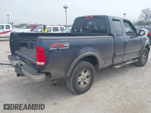 2002 Ford F-150 XL with VIN 1FTRX18W22NA26073, listed as a IAAI auction lot 42126819 with 212,893 mi miles and . Bid and sale history available at DreamBid. Image 4.