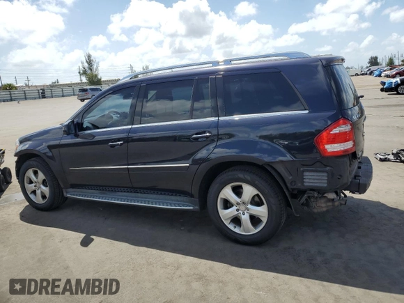 2012 Mercedes-Benz GL 450 z VIN 4JGBF7BE8CA774886, wystawiony jako Copart lot #51657035 z przebiegiem 185 844 mil mil oraz Szkoda całkowita • Salvage title. Historia ofert i sprzedaży dostępna na DreamBid. Obrazek 2.