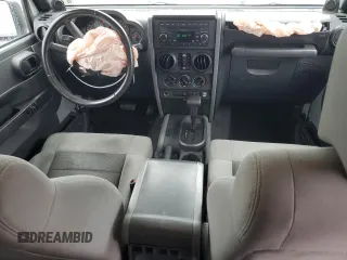 2008 Jeep Wrangler Unlimited X with VIN 1J4GB39148L565250, listed as a Copart auction lot 51170505 with 153,344 mi miles and Salvage Title. Bid and sale history available at DreamBid. Image 8.