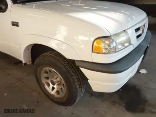 2002 Mazda B-Series 2WD Truck DS with VIN 4F4YR16V42TM25828, listed as a IAAI auction lot 41440414 with 132,334 mi miles. Bid and sale history available at carsss.com. Image 16.