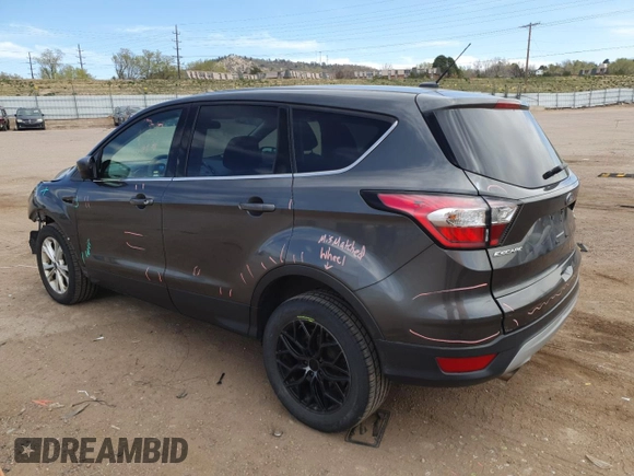 2017 Ford Escape SE with VIN 1FMCU9GD6HUE72847, listed as a Copart auction lot 53443735 with 106,462 mi miles and Salvage Title. Bid and sale history available at carsss.com. Image 2.
