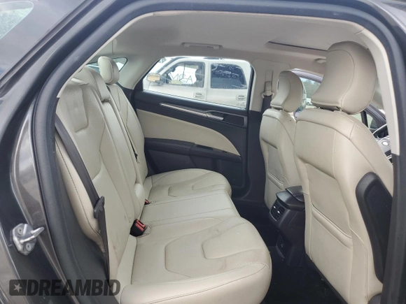2016 Ford Fusion Titanium with VIN 3FA6P0K90GR180288, listed as a Copart auction lot 60218155 with 140,502 mi miles and Salvage title. Bid and sale history available at DreamBid. Image 10.