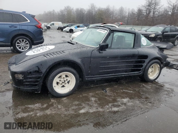 1977 Porsche 911 with VIN 9117212463, listed as a Copart auction lot 46277515 with Not provided miles and Clean title. Bid and sale history available at DreamBid. Image 1.