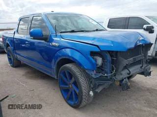 2015 Ford F-150 XL with VIN 1FTEW1CF7FKD47302, listed as a IAAI auction lot 41313284 with 125,985 mi miles. Bid and sale history available at carsss.com. Image 1.