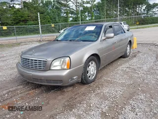 2003 Cadillac DeVille z VIN 1G6KD54Y73U130593, wystawiony jako IAAI lot #42377235 z przebiegiem 133 656 mil mil oraz . Historia ofert i sprzedaży dostępna na DreamBid. Obrazek 2.