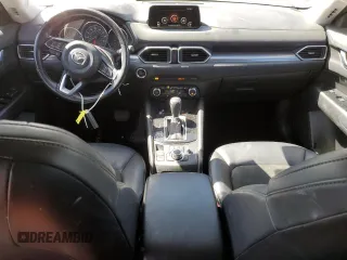 2017 Mazda CX-5 Touring with VIN JM3KFACL1H0100436, listed as a Copart auction lot 53058875 with 77,205 mi miles and Salvage Title. Bid and sale history available at DreamBid. Image 8.