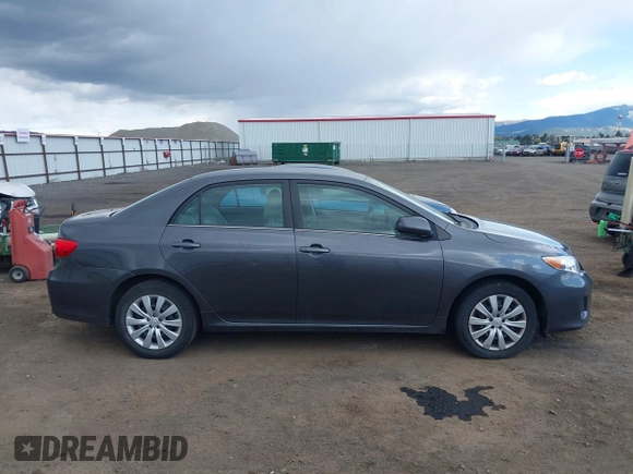 2013 Toyota Corolla L with VIN 2T1BU4EE7DC102626, listed as a IAAI auction lot 42087600 with 84,977 mi miles. Bid and sale history available at carsss.com. Image 12.
