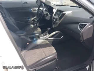 2015 Hyundai Veloster with VIN KMHTC6AD5FU231224, listed as a IAAI auction lot 41944186 with 103,124 mi miles. Bid and sale history available at carsss.com. Image 5.