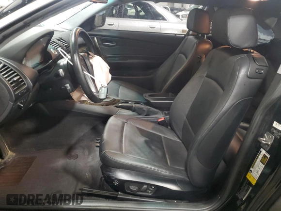 2011 BMW 1 Series 128i with VIN WBAUP9C58BVL90406, listed as a Copart auction lot 88237875 with 102,661 mi miles and Salvage title. Bid and sale history available at DreamBid. Image 7.