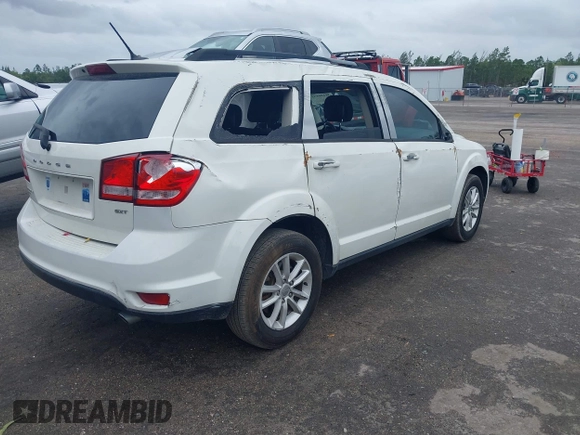2017 Dodge Journey SXT with VIN 3C4PDDBG3HT592061, listed as a IAAI auction lot 38299155 with 127,856 mi miles and . Bid and sale history available at DreamBid. Image 4.