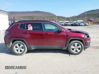 2020 Jeep Compass Latitude with VIN 3C4NJCBB1LT169941, listed as a IAAI auction lot 41785618 with 200,963 mi miles and . Bid and sale history available at DreamBid. Image 13.