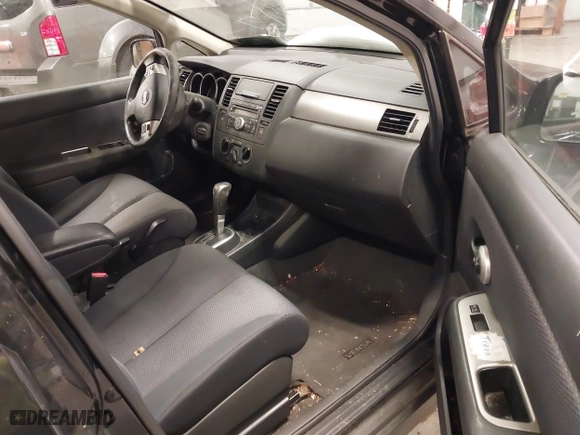 2009 Nissan Versa 1.8 S with VIN 3N1BC13E99L393142, listed as a IAAI auction lot 41377246 with 115,591 mi miles. Bid and sale history available at carsss.com. Image 5.