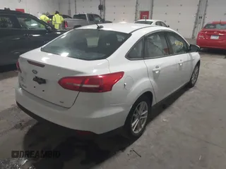2018 Ford Focus SE with VIN 1FADP3F29JL312721, listed as a IAAI auction lot 41012098 with 126,214 mi miles. Bid and sale history available at carsss.com. Image 4.
