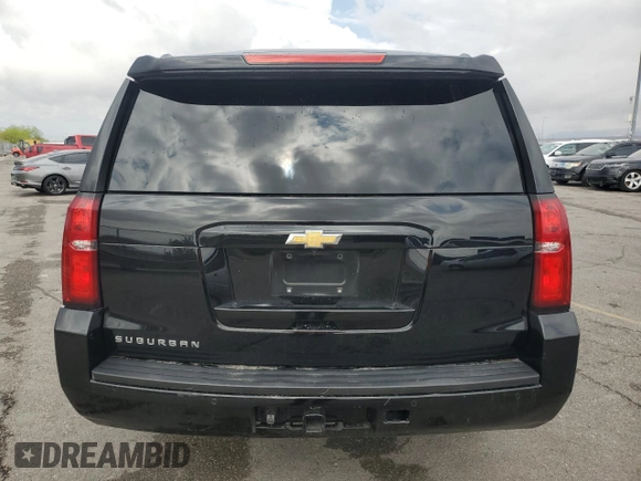 2018 Chevrolet Suburban LS with VIN 1GNSCGKC6JR303482, listed as a Copart auction lot 54703925 with 214,158 mi miles and Salvage title. Bid and sale history available at DreamBid. Image 6.