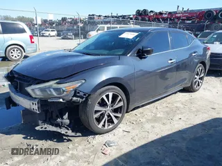 2016 Nissan Maxima SV z VIN 1N4AA6AP3GC383124, wystawiony jako IAAI lot #41821680 z przebiegiem 139 510 mil mil oraz . Historia ofert i sprzedaży dostępna na DreamBid. Obrazek 2.